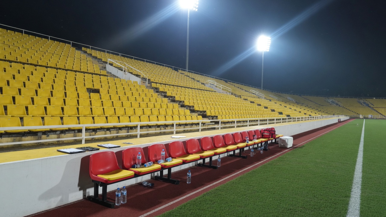 Sideline and team benches at Town Square stadium, Our Tampines Hub, under evening floodlights