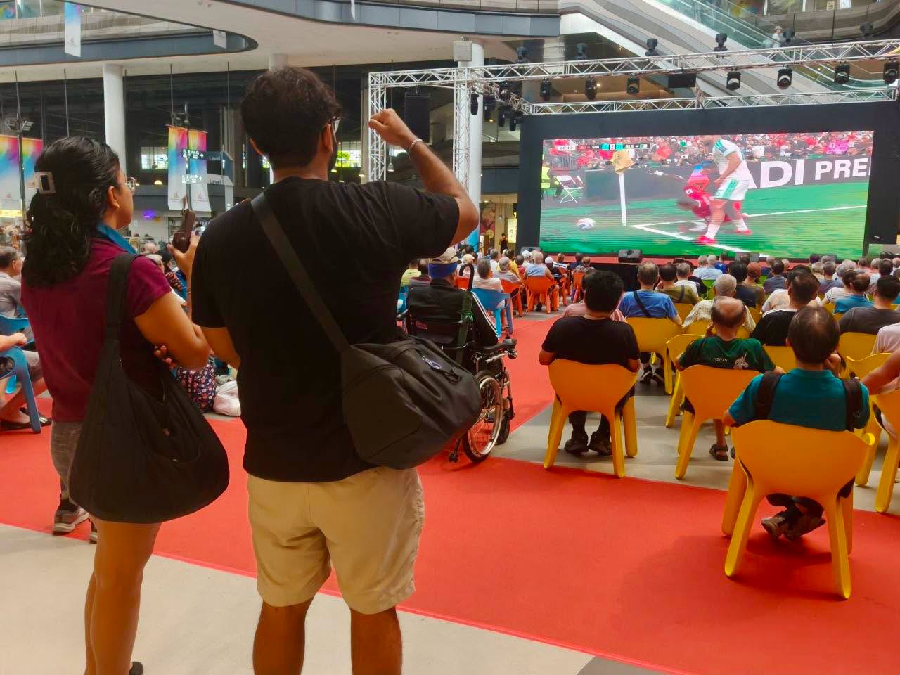 Large screen broadcasting World Cup match live at Our Tampines Hub community venue